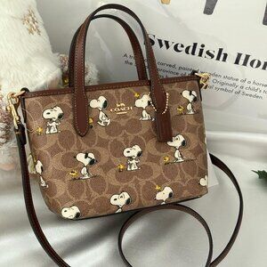 Coach X Peanuts City Mini Tote Bag In Signature Canvas Snoopy